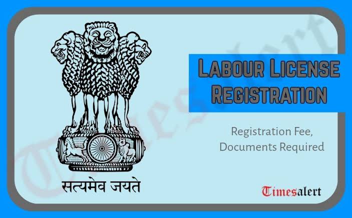 A person using a laptop in a modern office setting